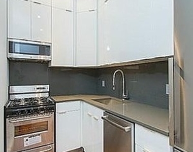 E 75th St. - Photo Thumbnail 2