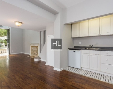 E 75th St. - Photo Thumbnail 1
