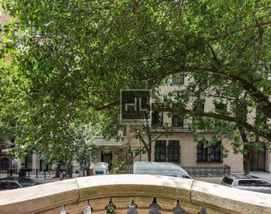E 75th St. - Photo Thumbnail 3