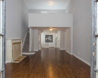 E 75th St. - Photo Thumbnail 1