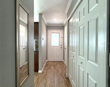 16335 Rambling Vine Drive W - Photo Thumbnail 1