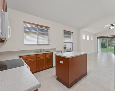 8838 Abbotsbury Drive - Photo Thumbnail 6
