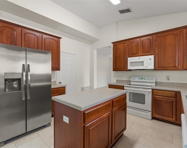 8838 Abbotsbury Drive - Photo Thumbnail 8
