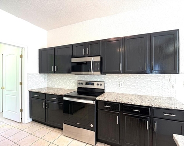 1131 N Hampton Drive - Photo Thumbnail 4
