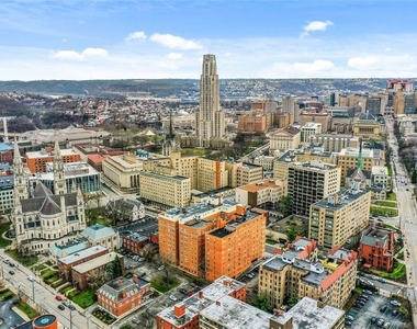 144 N Dithridge St - Photo Thumbnail 1
