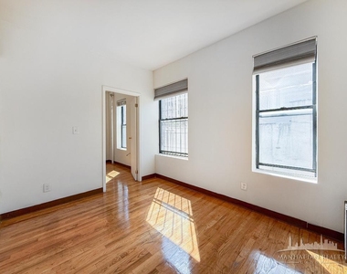 E 14th St - Photo Thumbnail 1
