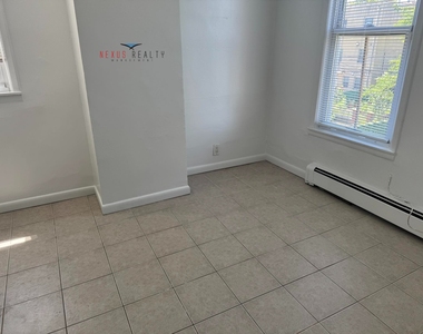 23-62 37th Street - Photo Thumbnail 8
