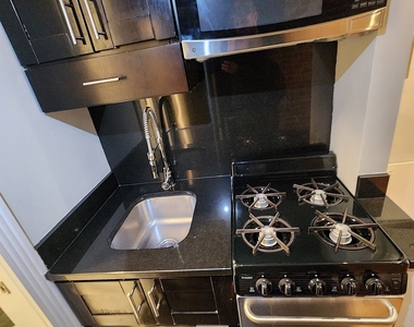 W 53rd St. - Photo Thumbnail 1