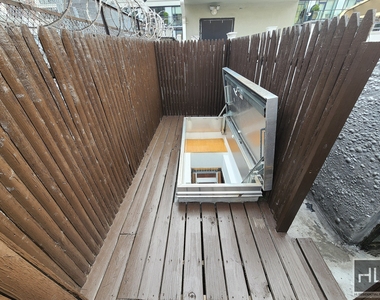 W 53rd St. - Photo Thumbnail 4