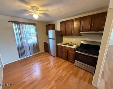 1955 E 8th Street - Photo Thumbnail 4
