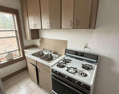 1165 E 10th Street - Photo Thumbnail 3