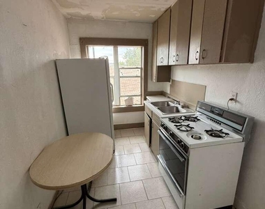 1165 E 10th Street - Photo Thumbnail 2