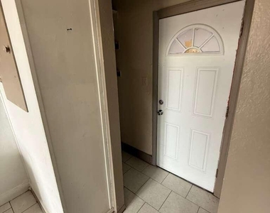1165 E 10th Street - Photo Thumbnail 1
