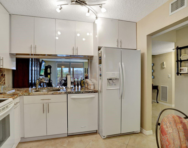 7561 Nw 1st Street Nw - Photo Thumbnail 3