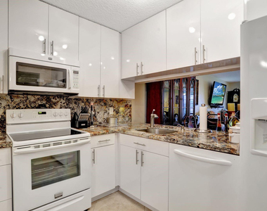 7561 Nw 1st Street Nw - Photo Thumbnail 1