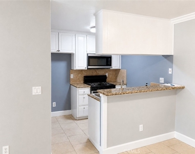 7035 Woodley Ave - Photo Thumbnail 2