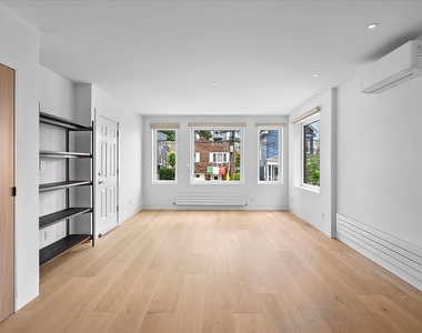 East 240th Street - Photo Thumbnail 2