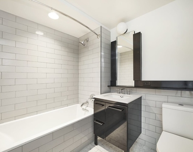 101 E 10th Street - Photo Thumbnail 2
