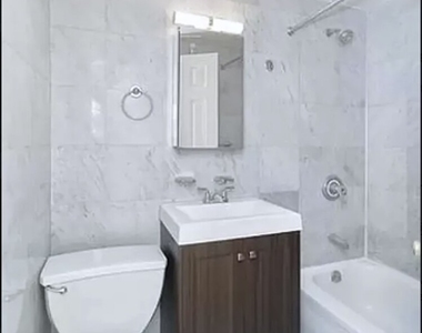 233 E 12th Street - Photo Thumbnail 3