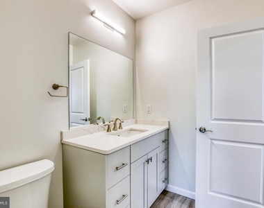 210 E Boscawen St - Photo Thumbnail 13