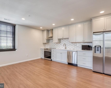 210 E Boscawen St - Photo Thumbnail 3