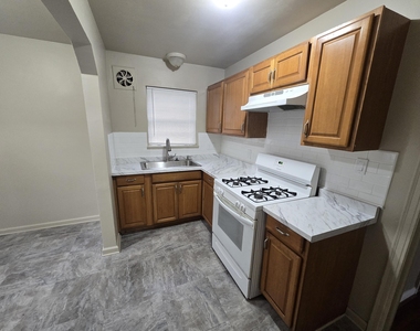 6109 Farmbrook Street - Photo Thumbnail 2