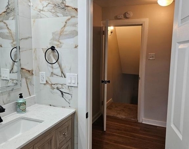 115 E 2nd Street - Photo Thumbnail 11