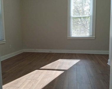 115 E 2nd Street - Photo Thumbnail 18