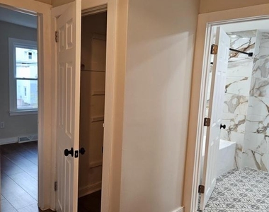 115 E 2nd Street - Photo Thumbnail 17