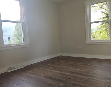 115 E 2nd Street - Photo Thumbnail 19