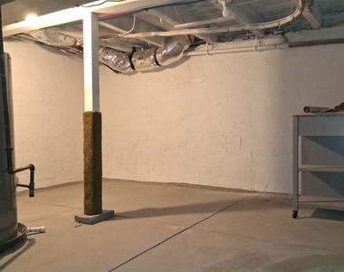 115 E 2nd Street - Photo Thumbnail 27