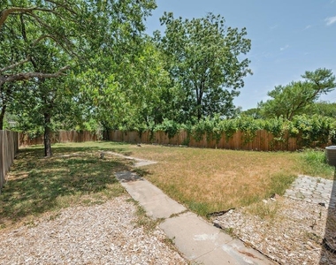 1312 E 52nd St - Photo Thumbnail 17
