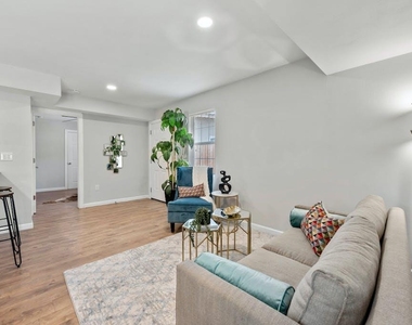 1312 E 52nd St - Photo Thumbnail 7