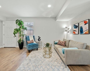 1312 E 52nd St - Photo Thumbnail 6