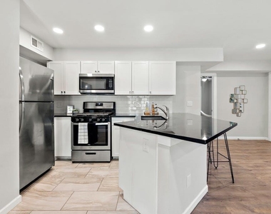 1312 E 52nd St - Photo Thumbnail 4