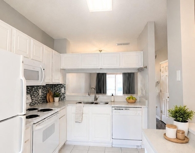 12311 Kensington Lakes Drive - Photo Thumbnail 2