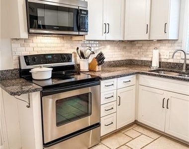 2841 Cravenridge Drive Ne - Photo Thumbnail 6