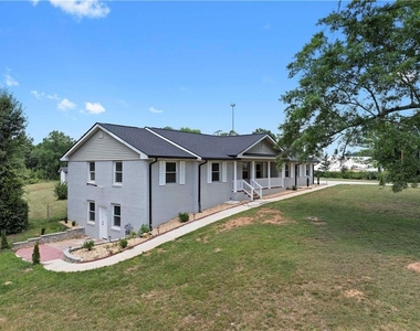 5245 Stonewall Tell Road - Photo Thumbnail 2