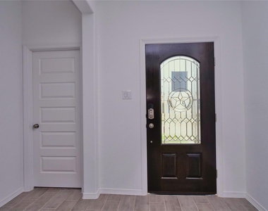 5735 Aurora Greens Lane - Photo Thumbnail 2