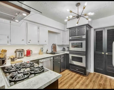 3107 Cherry Creek Drive - Photo Thumbnail 2