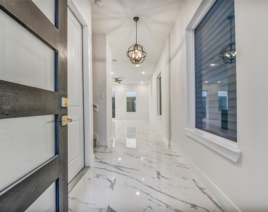 5906 Saint Augustine Street - Photo Thumbnail 3
