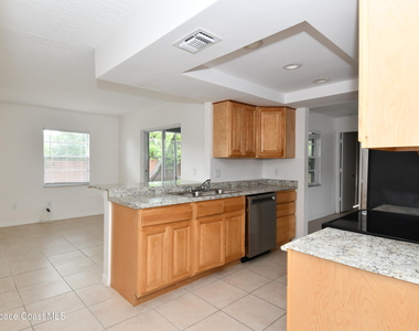 838 Gillen Avenue Nw - Photo Thumbnail 2