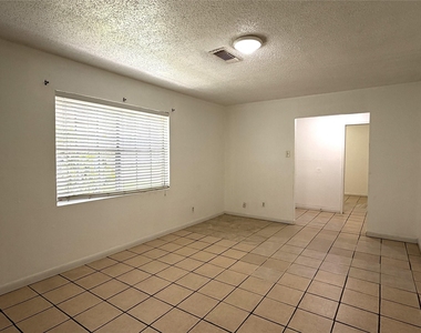 8842 Barton Street - Photo Thumbnail 3