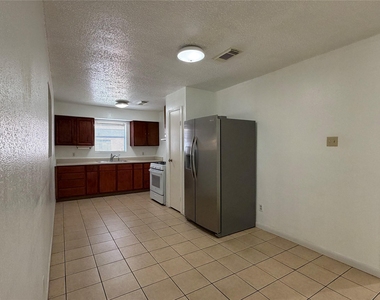 8842 Barton Street - Photo Thumbnail 4