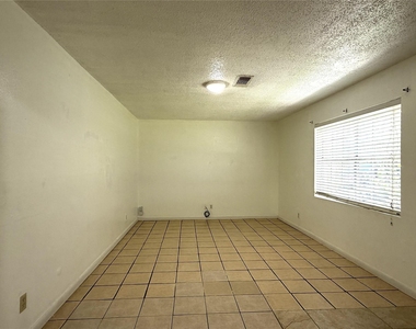 8842 Barton Street - Photo Thumbnail 2