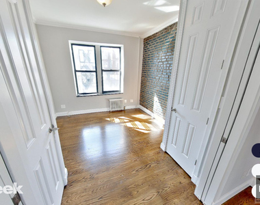 E 13th St. - Photo Thumbnail 1