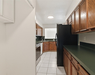 11000 Kinghurst Drive - Photo Thumbnail 4