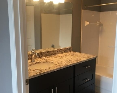 9744 Lake Chase Island Way - Photo Thumbnail 7