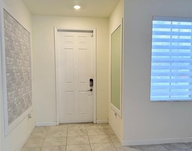 10306 W 33rd Lane - Photo Thumbnail 6