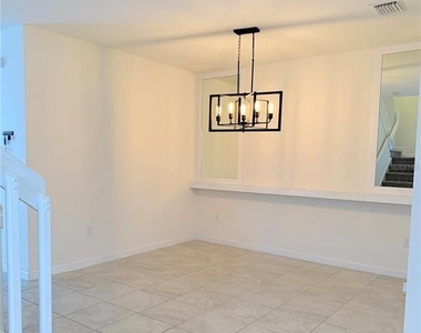 10306 W 33rd Lane - Photo Thumbnail 9